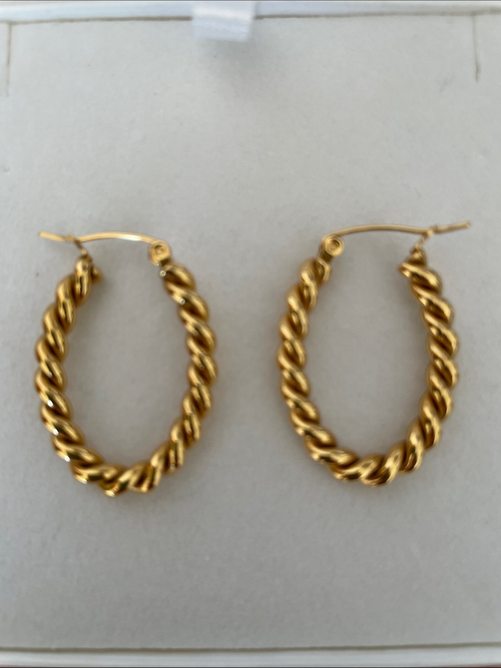 NWOT. Twisted Gold Hoop Earrings